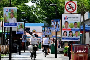 Poster Parti Tindakan Rakyat (PAP) dan Parti Pekerja (WP) yang ditampal semasa Pilihan Raya Umum (GE) 2020 di GRC East Coast.