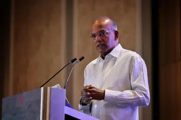 PERKUKUH SUARA: Encik Shanmugam berucap di persidangan anjuran Pusat Undang-Undang Antarabangsa Universiti Nasional Singapura (NUS) pada 15 Januari. 