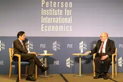 SUKAR BENDUNG CHINA: Akan semakin sukar untuk Amerika membendung China, kata Encik Lawrence Wong dalam dialog anjuran Institut Peterson bagi Ekonomi Antarabangsa di Washington DC yang dipengerusikan presiden institut itu, Dr Adam Posen. - Foto KEMENTERIAN KEWANGAN