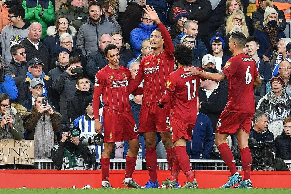 SAINGAN MUSUH TRADISI: Liverpool yang kali terakhir memenangi Piala FA pada 2006 akan menerima kunjungan 'jiran tetangga' Everton dalam pertemuan pusingan ketiga Piala FA nanti. - Foto AFP