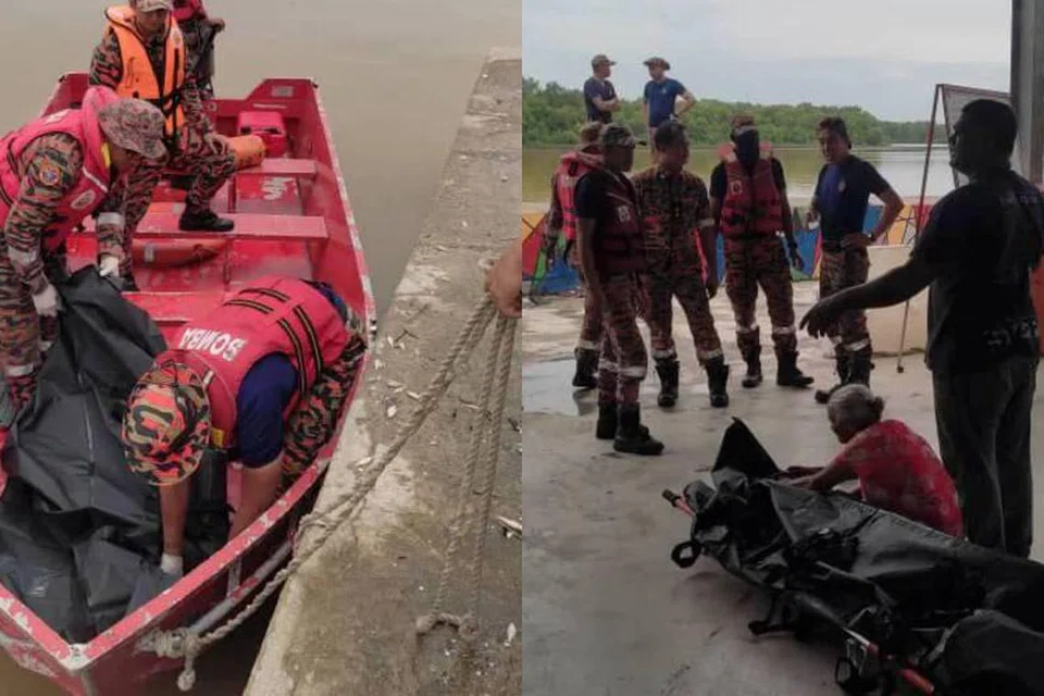 Anggota bomba membawa naik mayat seorang lelaki yang ditemui lemas ketika cuba melarikan diri daripada operasi polis di Jalan Bagan Sungai Yu, Pasir Penambang, Kuala Selangor, Selangor pada 17 April.
