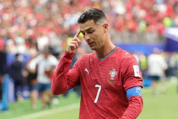Cristiano Ronaldo dari Portugal berjalan meninggalkan padang selepas pasukannya seri 1-1 dengan Republik Demokratik Congo dalam perlawanan Kumpulan K Piala Dunia 2026 di Stadium Houston, Texas, pada 17 Jun.
