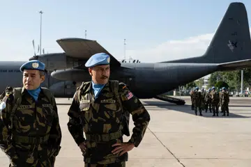 KEWIBAWAAN TENTERA MELAYU: Bront Palarae (kanan) yang kebiasaannya dilamar bagi projek filem seram terharu dapat menjayakan filem Malbatt: Misi Bakara yang bersandarkan kisah sebenar askar Malaysia menyumbang pada medan antarabangsa di Somalia. Bersamanya ialah Tony Eusoff.