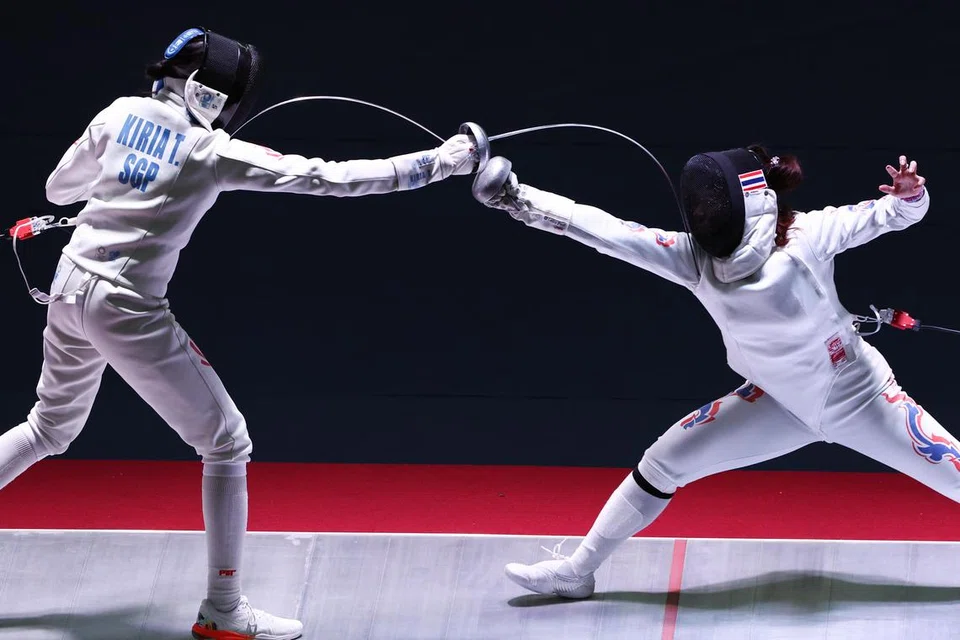 Kiria Tikanah Abdul Rahman (kiri) semasa perlawanan menentang Thailand di Sukan SEA di Vietnam pada 2022.