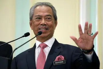 Perdana Menteri Malaysia Muhyiddin Yassin berucap di sidang media di Putrajaya, Malaysia pada 11 Mac 2020.