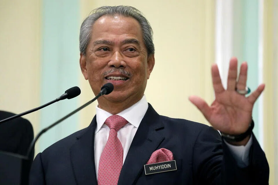 Perdana Menteri Malaysia Muhyiddin Yassin berucap di sidang media di Putrajaya, Malaysia pada 11 Mac 2020.