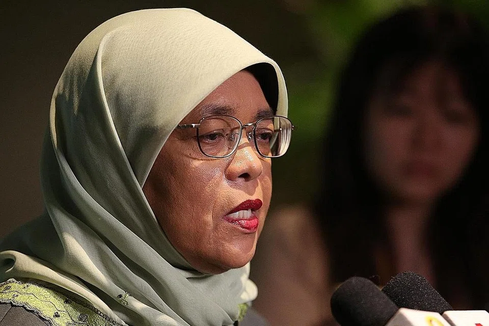 MENYUBUR USAHA KEHARMONIAN JAGAT: Presiden Halimah Yacob di Persidangan Antarabangsa Mengenai Masyarakat Bersatu Padu di Pusat Konvensyen Raffles City semalam. - Foto CMG