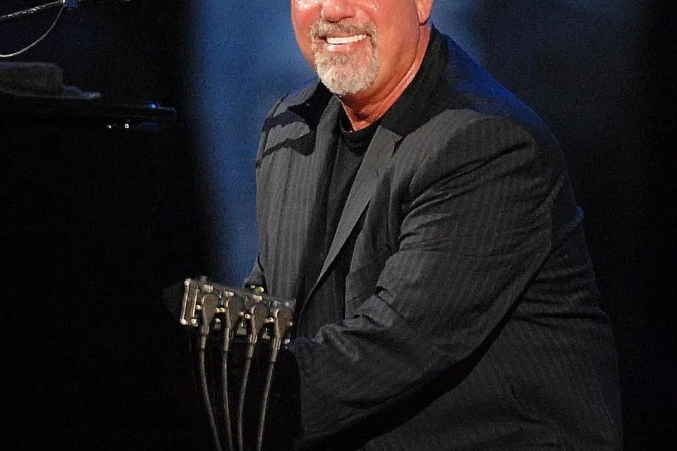 BILLY JOEL: Meskipun tidak muncul dengan album baru sejak 1993, lagu lamanya tetap mempesona di setiap konsert yang dijayakan. - Foto BIOGRAPHY.COM 