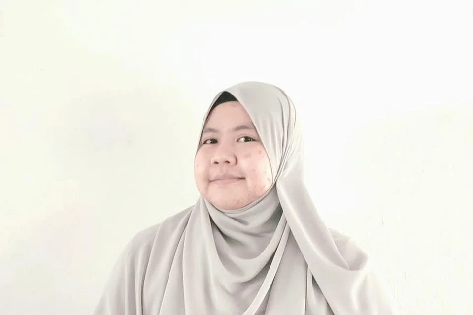 Ustazah Zahratur Rofiqah Mochamad Sandisi