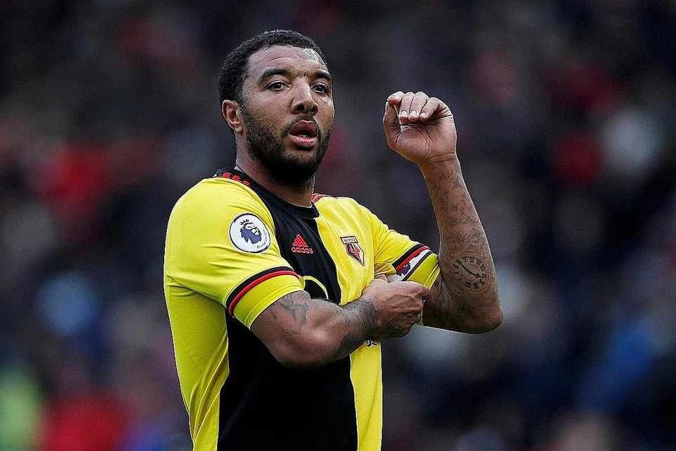 BIMBANG ANAK DIJANGKITI: Kapten Watfod Troy Deeney belum turun latihan bersama pasukannya kerana bimbang menjangkitkan Covid-19 pada anak kecilnya yang mengalami masalah pernafasan. - REUTERS 