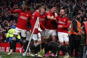 Pemain Manchester United meraikan gol kemenangan ke atas Liverpool dalam masa tambahan menyusuli jaringan Amad Diallo, sekali gus menjamin tempat United di separuh akhir Piala FA pada April.
