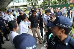DIDAKWA: Sheikh Md Razan, 29 tahun, ditangkap di Muscat Street di Kampong Glam, di kawasan tempat tinggalnya.