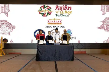 Memorandum Persefahaman (MOU) antara Shaabaz Events Hub, Aftertaste, United World Halal Development dan Kedutaan Filipina dimeterai oleh (dari kiri) wakil Kedutaan Filipina, Cik Rosellie L. Bantay; pengasas Aftertaste, Cik Nicke Wong; pengasas Shaabaz Events Hub, Encik Abdul Malieq Abdul Salam; dan pengerusi United World Halal Development, Dr Mohamed Jinna, pada 18 Ogos untuk melangsungkan Festival Perkampungan Asia pada Oktober.