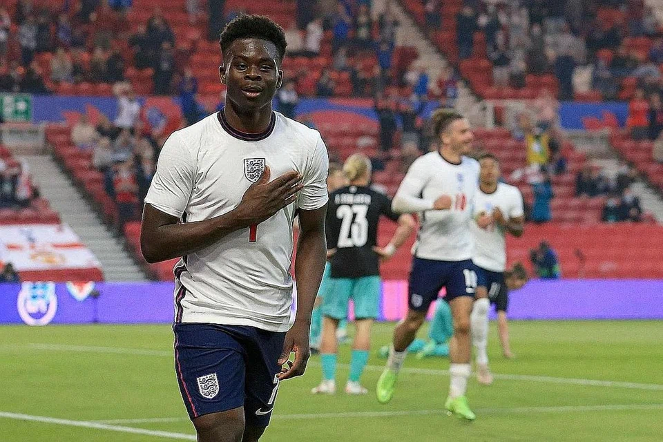 GOL KEMENANGAN: Pemain England Bukayo Saka meraikan jaringan pada aksi persahabatan menentang Austria di Stadium Riverside, Middlesbrough. - Foto-foto AFP 
