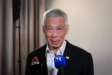 Menteri Kanan, Encik Lee Hsien Loong.