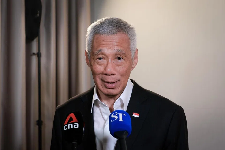 Menteri Kanan, Encik Lee Hsien Loong.