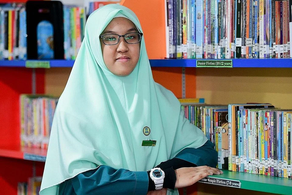 DAPAT KEPUTUSAN BAIK: Laiqa Rasyiqah Muhammad Ridzwan jaya raih markah cemerlang dan layak ke aliran Ekspres. - Foto MUIS