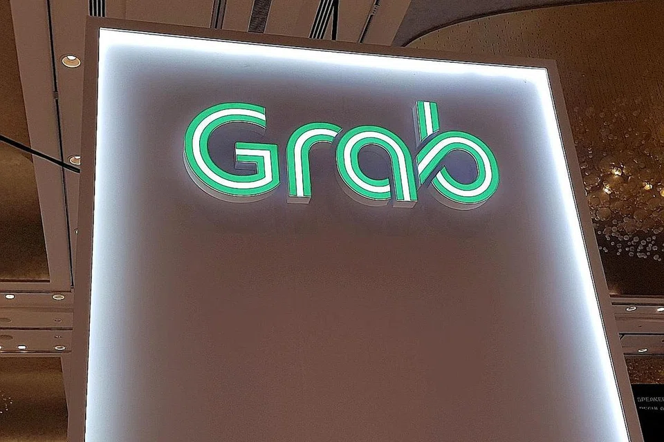 TIADA RUNDINGAN: Gojek sifatkan laporan mengenai rundingan dengan Grab untuk saling bergabung adalah tidak tepat. - Foto ZAOBAO, REUTERS