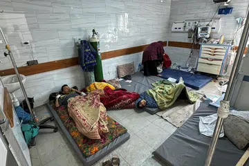 Orang awam yang cedera dilihat terbaring di atas tilam di hospital Kamal Adwan, di Jabalia, utara Jalur Gaza, pada 26 Oktober.