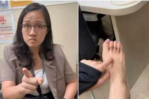 SOAL SIASAT: Tangkap layar video yang dimuat naik menunjukkan pegawai siasatan polis menyoal siasat wanita yang didakwa berkelakuan kesat secara lisan kepada kakitangan di Hospital Besar Singapura (SGH) pada Selasa.
