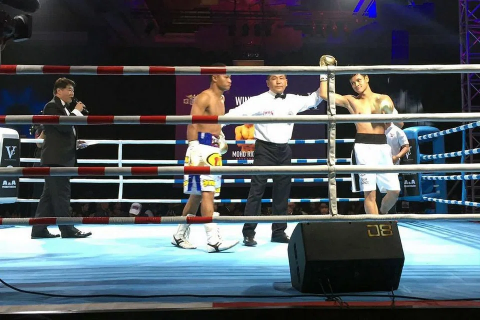 90 SAAT: Ridhwan menumbangkan lawannya dalam masa kurang dua minit minggu lalu. - Foto NABILLA AZIZ 