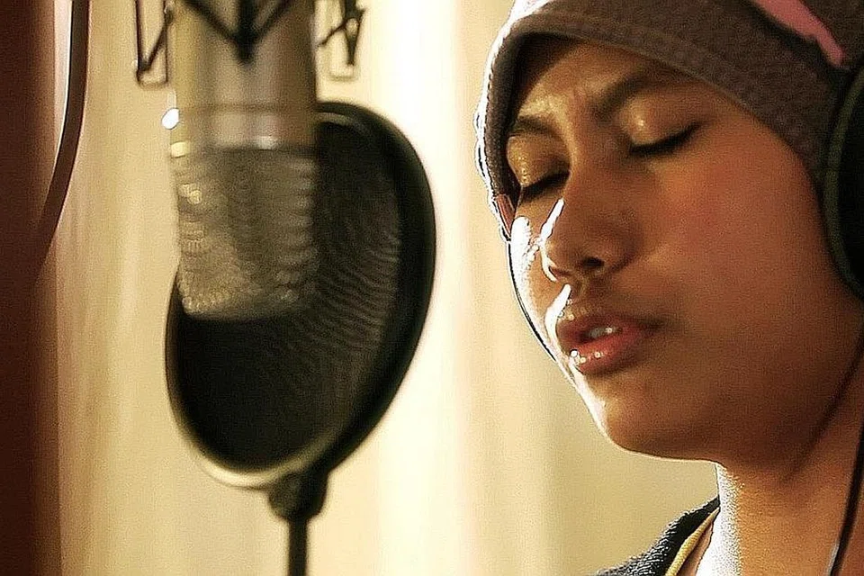 Cik Norsimah Aman, mengenai madah berlagu dan video muzik yang digubah dan dirakam anaknya, Farah Diyanah Rosli, sebelum beliau meninggal dunia akibat barah otak.- Foto CCF