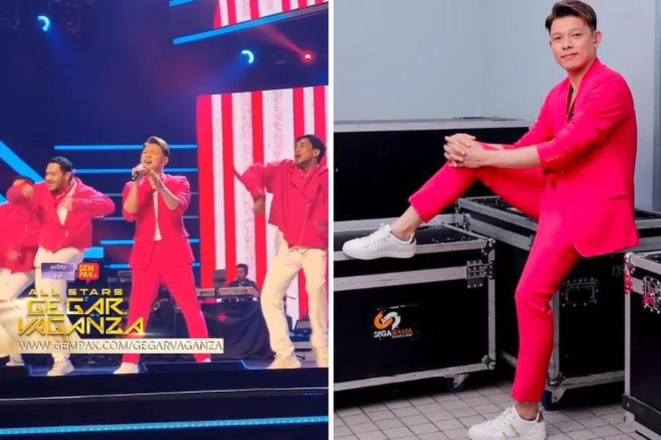 PERSIS BINTANG K-POP: Hady Mirza kelihatan berpakaian sut merah jambu dan menari dengan sekumpulan penari semasa menyampaikan lagu Hati pada Ahad lalu.
