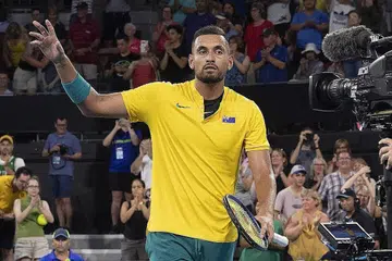 KEMENANGAN HEBAT: Kyrgios semasa beraksi dalam perlawanan perseorangan menentang Tsitsipas kelmarin. - Foto AFP