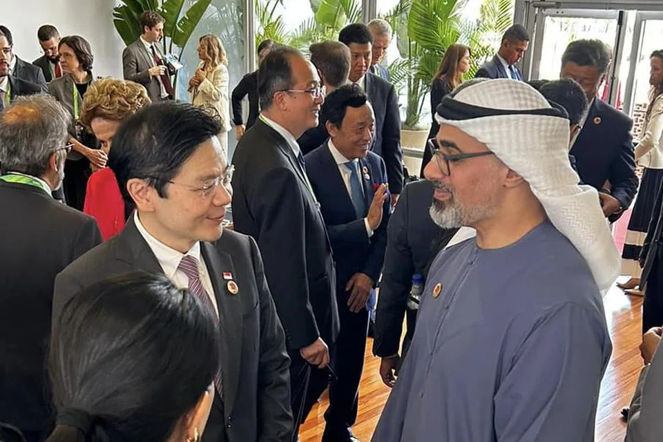 Perdana Menteri Encik Lawrence Wong (kiri) bersama Presiden Amiriah Arab Bersatu (UAE), Sheikh Mohamed Zayed Al Nahyan, di Sidang Puncak Kumpulan 20 (G20) di Rio de Janeiro, Brazil.