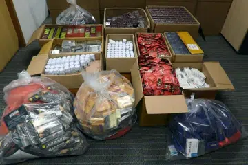 HSA merampas 62,000 unit dadah seks haram bernilai lebih $90,000 dari sebuah rumah di Sims Drive pada 20 Januari 2021. - 