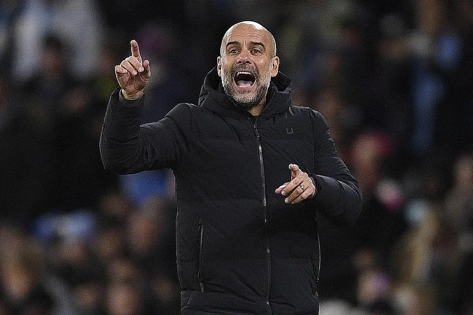KURANG MEMBARA: Pep Guardiola ingin kembalikan semangat membara pasukannya yang dianggapnya mula pudar. - Foto AFP