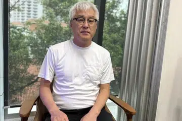 Tsutomu Ogura, bola sepak, skuad Singa