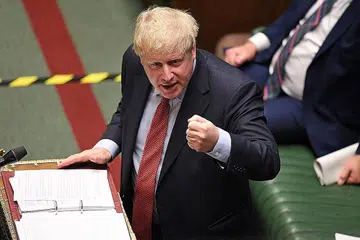MAHU KEPUTUSAN DITARIK BALIK: Anggota Parlimen Parti Konservatif, yang dianggotai Encik Boris Johnson, bertekad memaksa pemerintah menarik balik keputusan yang diambil Januari lalu untuk membenarkan Huawei membekalkan peralatan 5G kepada Britain. - Foto REUTERS