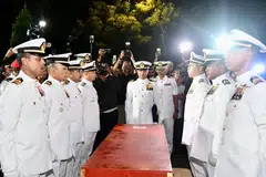 Jenazah mangsa nahas udara dua helikopter Tentera Laut Diraja Malaysia (TLDM) yang terhempas di Pangkalan TLDM, Lumut, Perak, disemadikan mengikut tradisi ketenteraan TLDM.