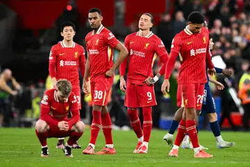 Para pemain Liverpool kecewa selepas tumpas di tangan PSG di pusingan 16 Liga Juara-Juara Eropah (UCL) pada 12 Mac. 