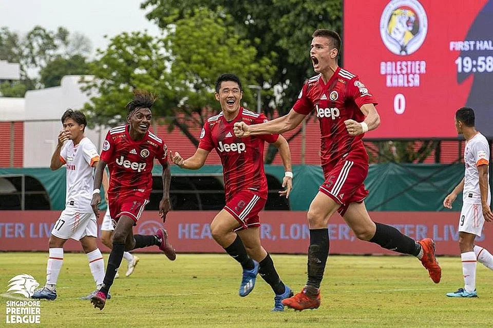 RIANG SEMENTARA: DISEKAT: (Dari kanan) Pemain Balestier Ensar Bruncevic meraikan golnya bersama Shuhei Hoshino dan Karthik Raj di Stadium Bishan sabtu lalu. - Foto AIA SINGAPORE PREMIER LEAGUE FACEBOOK