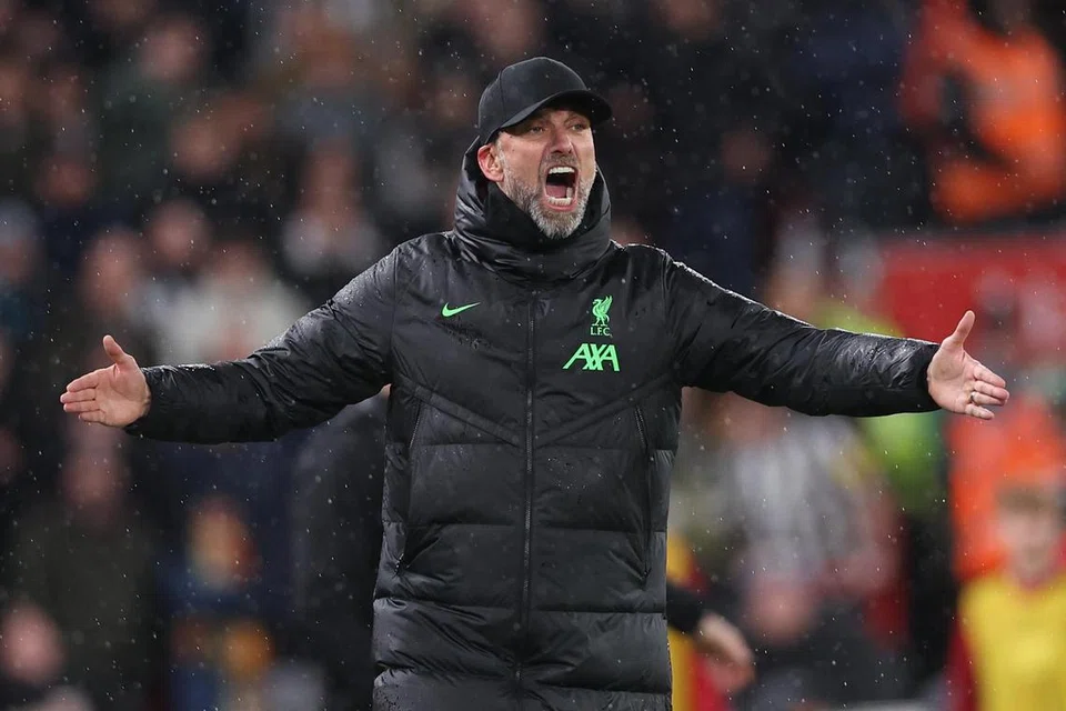 GEMBIRA DENGAN SKUAD: Pengurus Liverpool, Jurgen Klopp melahirkan rasa bangganya dengan skuad kendaliannya selepas berjaya menundukkan Arsenal di padang lawan.