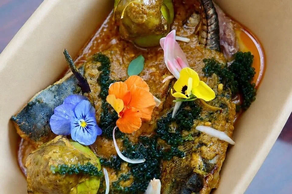 Nasi Ulam Asam Pedas Ikan Cencaru, $19.50.