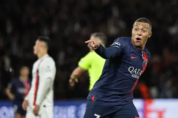 PENGGUGAT LAWAN: Penyerang Kylian Mbappe meraikan golnya yang memulakan jaringan Paris Saint Germain dalam kemenangan 3-0 ke atas AC Milan.
