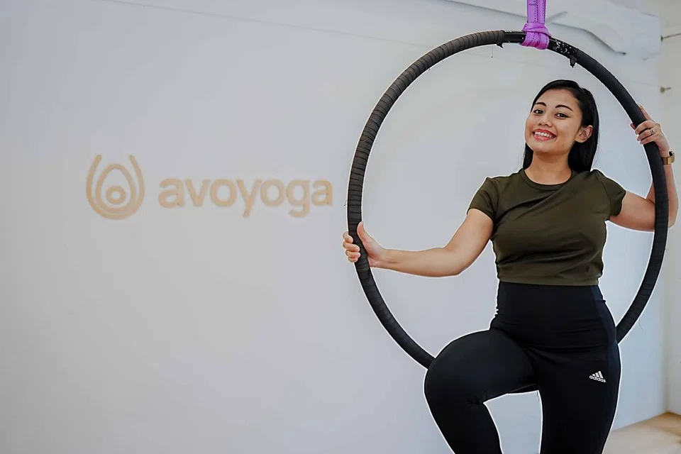 Pengasas studio yoga udara atau ‘aerial yoga’, Avoyoga, Cik Raidah Syafiqah Ahmad, yang terletak di 23 Kampong Bahru Road.