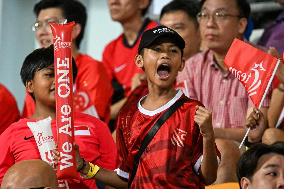 Penyokong Singa di Stadium Jalan Besar.