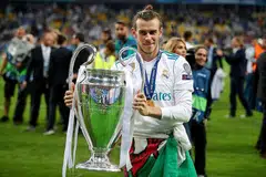 KERJAYA MENAKJUBKAN: Gareth Bale merai kejayaannya memenangi Liga Juara-Juara bersama Real Madrid, yang mengalahkan Liverpool pada final 2018. Pemain antarabangsa Wales ini menjuarai pertandingan itu lima kali bersama Real. - FOTO REUTERS