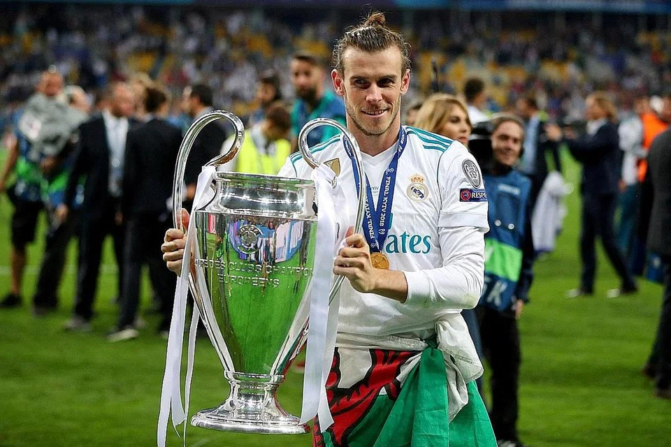 KERJAYA MENAKJUBKAN: Gareth Bale merai kejayaannya memenangi Liga Juara-Juara bersama Real Madrid, yang mengalahkan Liverpool pada final 2018. Pemain antarabangsa Wales ini menjuarai pertandingan itu lima kali bersama Real. - FOTO REUTERS