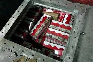 TERSEMBUNYI DI KAPAL: Sebahagian daripada sekitar 804 karton dan 43 peket rokok yang dirampas ICA dari kapal berdaftar di Indonesia Sabtu lalu yang duti dan cukainya masing-masing berjumlah $75,460 dan $7,100. - Foto ICA