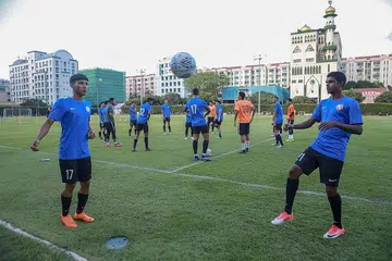 GIGIH DAN BERSEMANGAT: Dua pemain muda, Muhammad Zulqarnaen Suzliman (kiri) dan Prakash Raj, menunjukkan peningkatan memberangsangkan sejak mengikuti latihan Singa Muda kendalian Fandi Ahmad awal tahun ini.