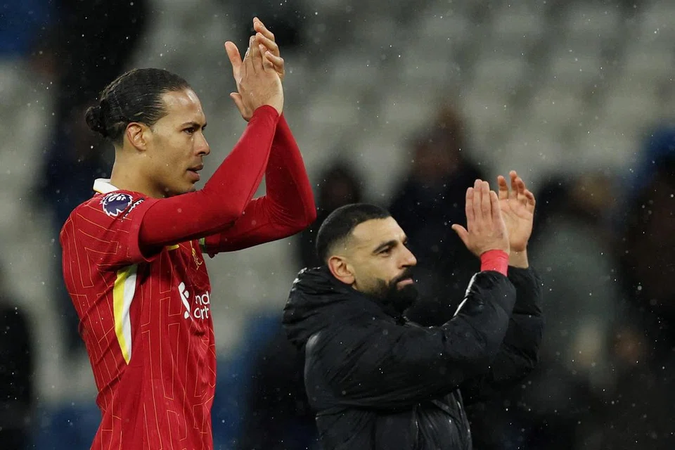 Pemain utama Liverpool, Virgil van Dijk (kiri) and Mohamed Salah, tonggak kecemerlangan Liverpool musim ini.