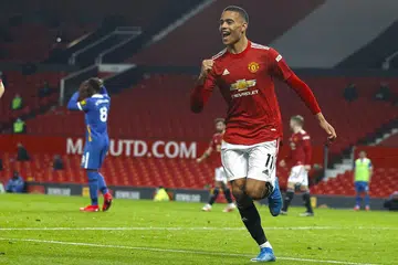 JANGAN NILAI JARINGAN GOL: Greenwood meraikan gol Liga Perdana pertamanya sejak Mei 2020 dan yang keenam dalam 40 penampilan dalam semua pertandingan musim ini. Gol pada minit ke-83 itu juga memberikan Manchester United kemenangan 2-1 ke atas Brighton di Old Trafford kelmarin. - Foto EPA-EFE