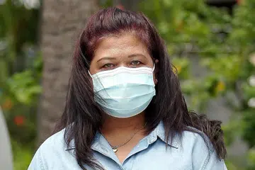 ORANG PERTAMA TUNTUT PAMPASAN: Cik Parti Liyani menjumlahkan kerugian yang dialaminya sebanyak $73,100, tetapi had jumlah tuntutan daripada AGC ialah $10,000. - Foto BH oleh WONG KWAI CHOW