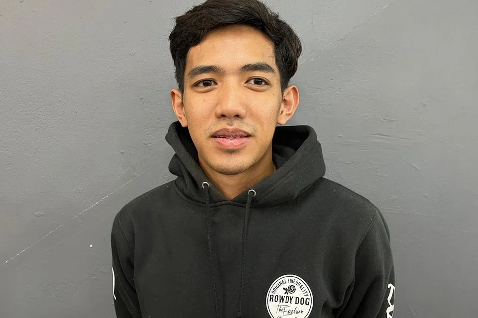 Pelanggan tetap kedai gunting rambut Gombak Barbers Turf (GBT) di Batu Caves, Selangor, Encik Ahmad Abdul Naser, 24 tahun.