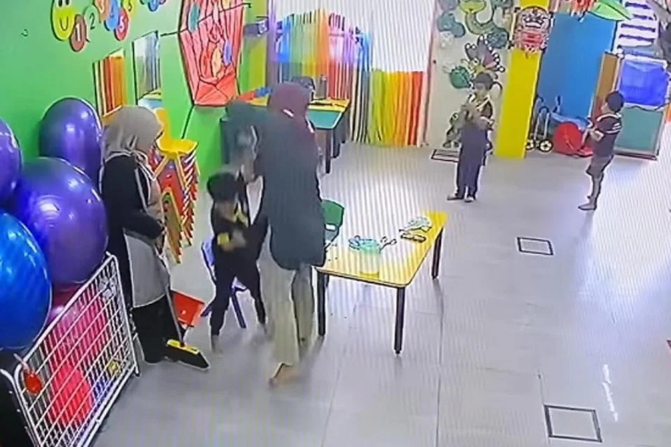 DIBERKAS: Sharifah Mazlan diberkas kerana aniaya kanak-kanak berkeperluan khas dalam jagaannya. - Foto-foto FACEBOOK